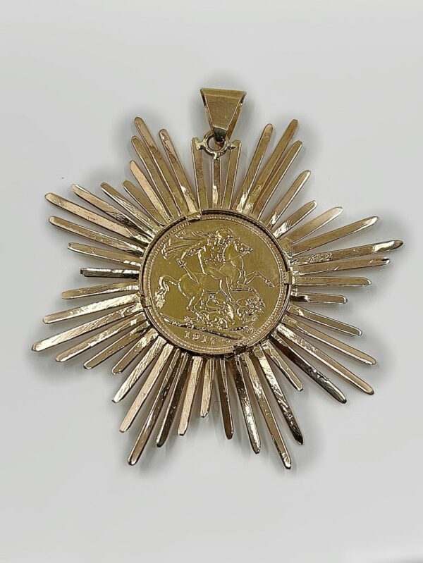 Pendentif porte piéce Soleil or 19.40grs souverain