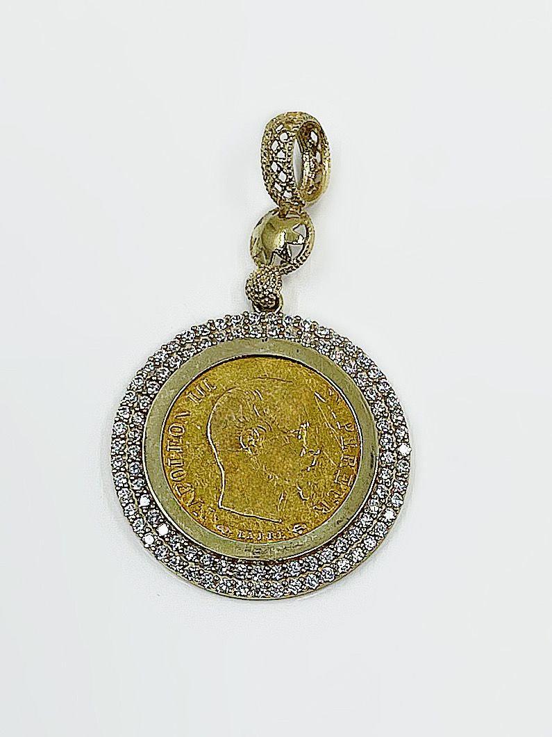 Pendentif porte piéce 10frs or 18k 7.51grs