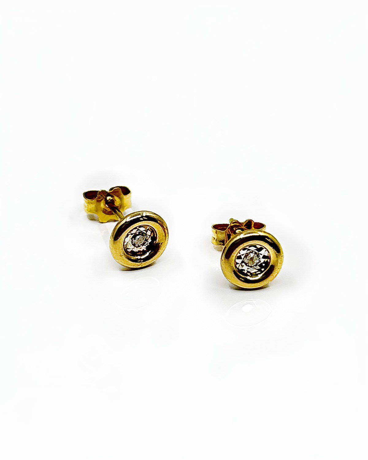 Boucles d'oreilles diamants or 18k 1.09grs 0.06ct