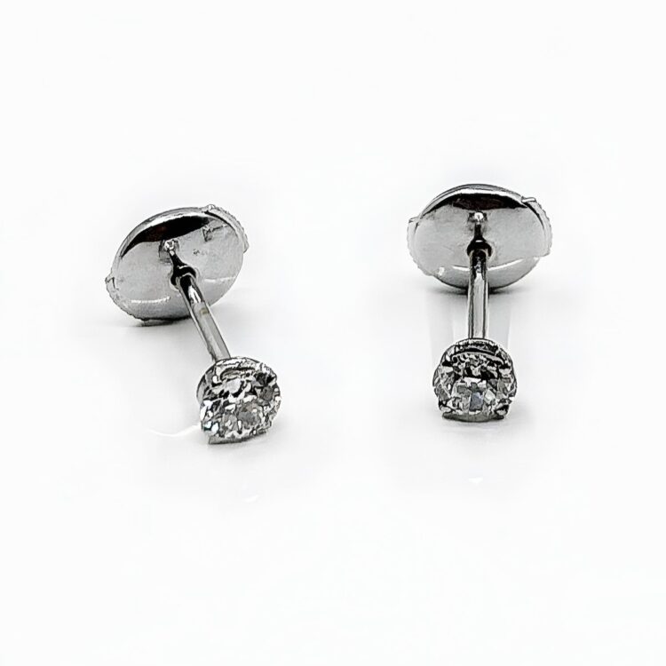 Boucles d'oreilles or 18k 1.57grs diamant 0.50 crt