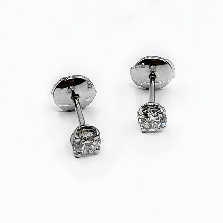 Boucles d'oreilles or 18k 1.74grs diamant 0.60 crt